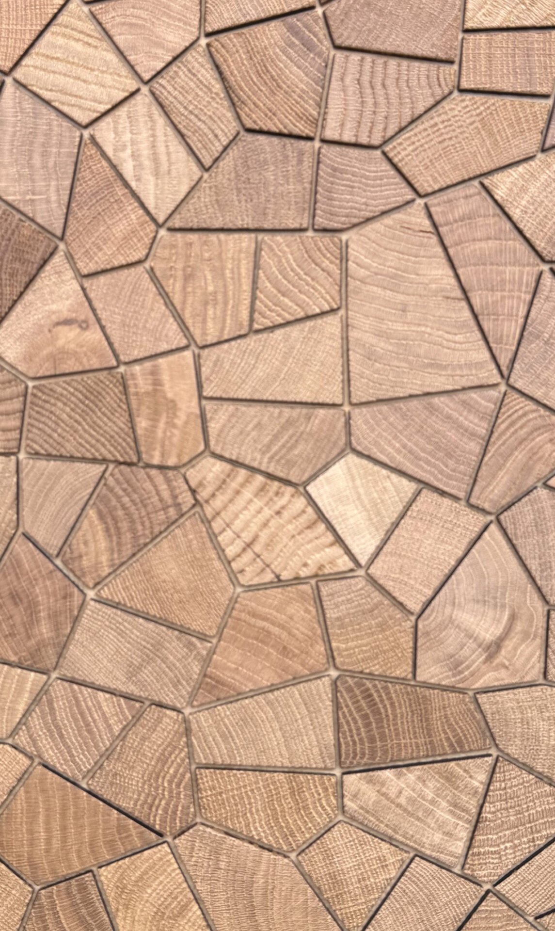 Organic mosaic end grain wood flooring with irregular block pattern for architectural applications