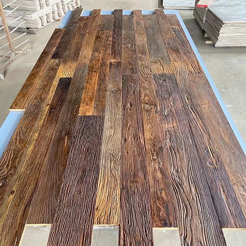 Reclaimed elm flooring with weathered texture